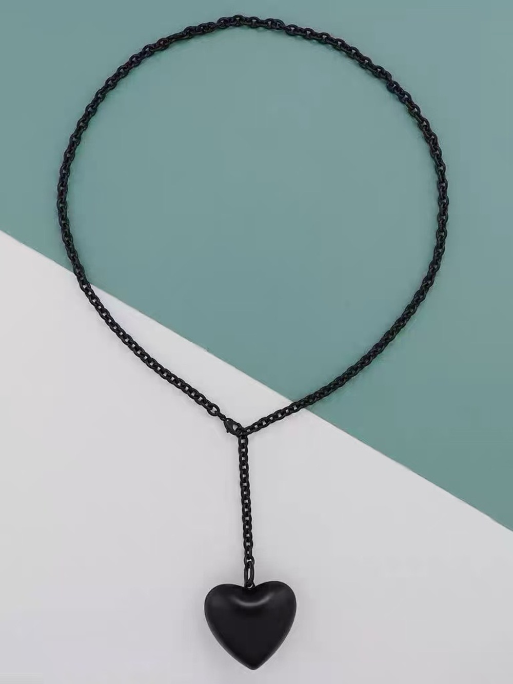 Roxanne Assoulin The Puffy Heart Necklace in black chain with black pendant